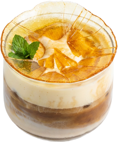 Signature Lynx latte in a double-walled glass cup